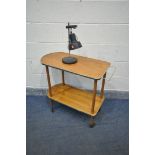 A 1960'S TEAK TEA TROLLEY (loose handle) along with a desk lamp (2)