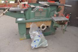 A KITY K5 COMBINATION WOODWORKING TOOL on rolling base, with all attachments not fully assembled but
