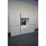 A WHITE FINISH THREE PIECE BEDROOM FITMENT, overall width 230cm