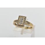 A 9CT GOLD DIAMOND DRESS RING, of rectangular design the calibre cut diamond panel, with single