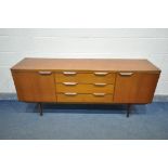 A MID-CENTURY AUSTINSUITE TEAK SIDEBOARD, with double cupboard doors flanking three drawers,