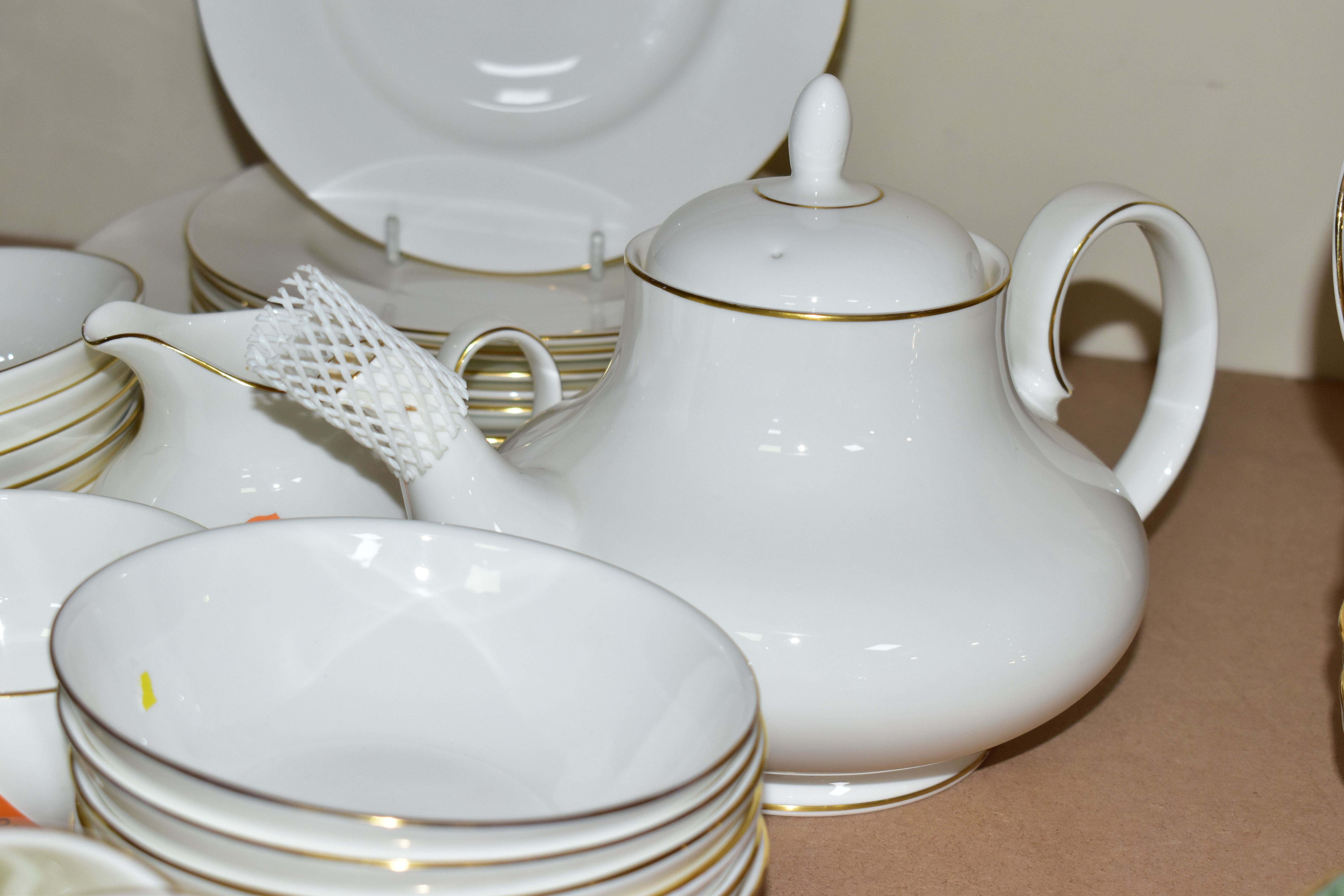 A ROYAL DOULTON 'SOPHIA' PATTERN PART DINNER AND TEA SET, comprising eight cups H5126 (one cup has a - Image 2 of 4