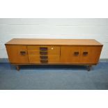 A BATH CABINET MAKERS 1960'S TEAK SIDEABOARD, with a single and double cupboard doors that a both