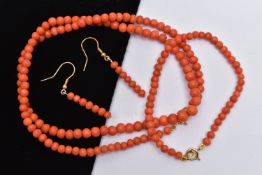 A CORAL NECKLACE, BRACELET AND EARRING SET, each comprised of approximately 5mm circular beads,