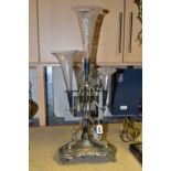 A VICTORIAN SILVER PLATE EPERGNE, (centrepiece) three winged Griffins adorn the base, height 60cm to