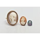 A 9CT GOLD CAMEO RING, an oval shell cameo, set in a yellow gold collet setting with rope detailing,