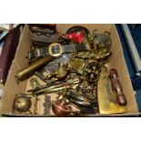 ONE BOX OF BRASSWARE, to include horse leathers, one brass iron, one cast iron, a long handled