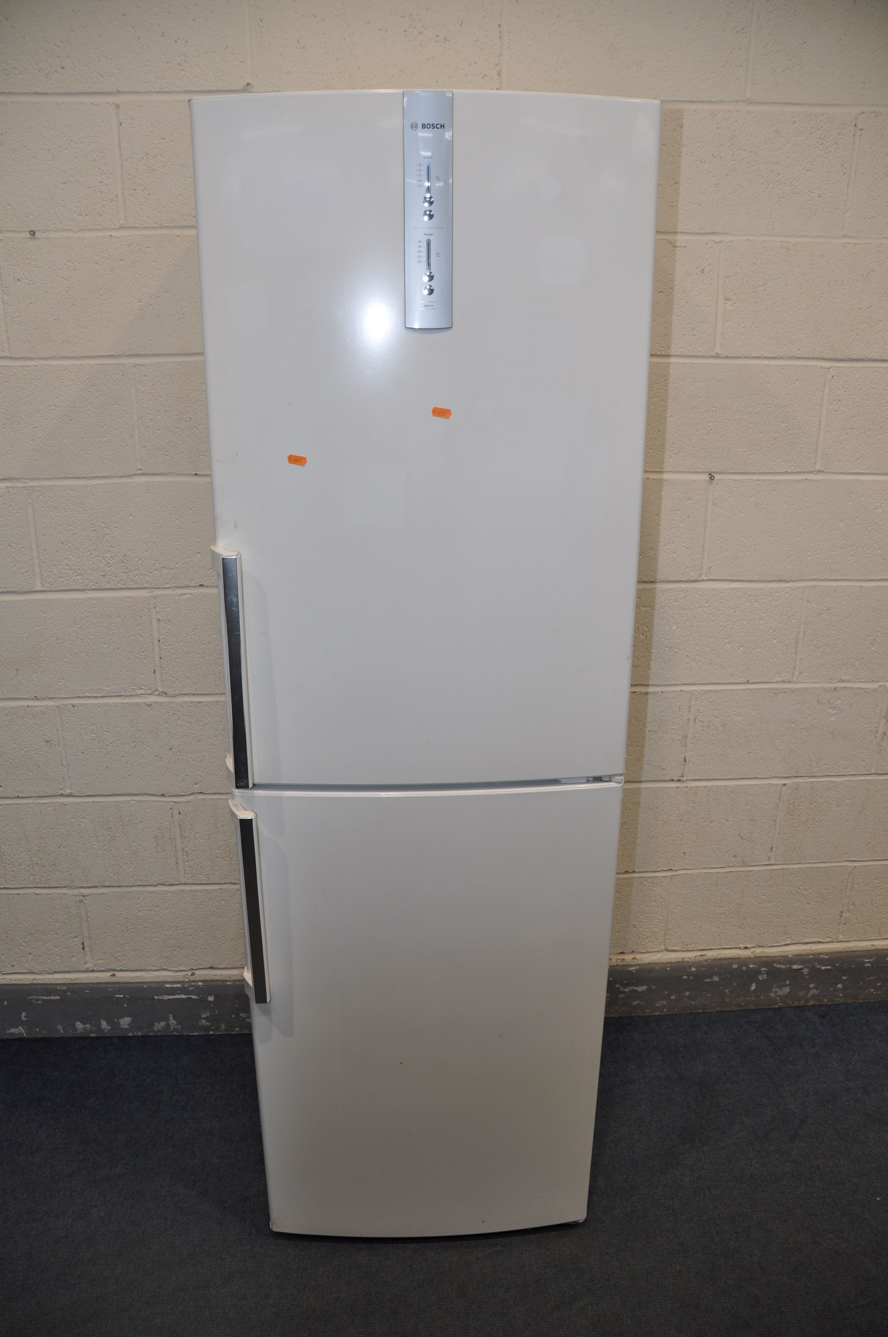 A BOSCH KGN34A00GB FRIDGE FREEZER, measuring width 60cm x depth 60cm height 186cm, and a Panasonic