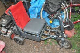 AN eFOLDI FOLDING DISABILITY SCOOTER with charger but no key (untested)