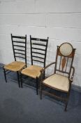 A PAIR OF GIO PONTI STYLE EBONISED CHAIRS, with a rush seat (condition:-no signatures/labels,