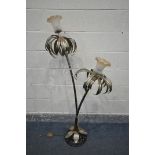 A MID CENTURY BRASS TWIN BRANCH FLOOR LAMP, of a tropical plant with bamboo effect stem, with etched