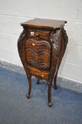 A FRENCH STYLE HARDWOOD PLANT STAND, with two drawers and fall front compartment, on cabriole