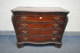 A REPRUCTION GEORGIAN STYLE MAHOGANY SERPENTINE CHEST OF FOUR LONG GRADUATED DRAWERS, with a