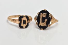 TWO VICTORIAN INITIAL MOURNING RINGS, the first designed with an oval cut onyx displaying the