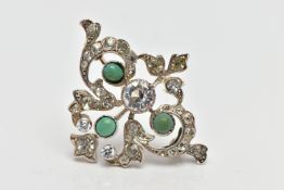 A WHITE METAL PASTE BROOCH, thirty three old cut paste stones and three green cabochon stones