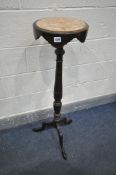 A 19TH CENTURY MAHOGANY TORCHERE STAND, with a circular marble top, and a wavy apron, turned support