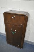 AN ART DECO MAHOGANY COCKTAIL CABINET, with a lifting top, width 69cm x depth 37cm x height 125cm,