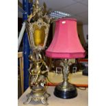 TWO BRASS TABLE LAMPS, one with a dark red shade, height 58cm to top of shade, a brass stand with