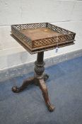 A REPRODUCTION VICTORIAN STYLE SIDE TABLE, with an open fretwork gallery, single brushing slide,