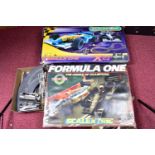 TWO BOXED SCALEXTRIC FORMULA ONE MOTOR RACING SETS, one (C741) is complete with both cars, Lotus 98T