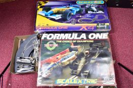 TWO BOXED SCALEXTRIC FORMULA ONE MOTOR RACING SETS, one (C741) is complete with both cars, Lotus 98T