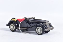 AN UNBOXED BANDAI TINPLATE FRICTION DRIVE M.G. SPORTS CAR, black body with red interior, cream
