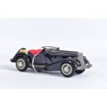 AN UNBOXED BANDAI TINPLATE FRICTION DRIVE M.G. SPORTS CAR, black body with red interior, cream