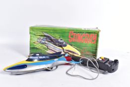 A BOXED LINCOLN INTERNATIONAL PLASTIC BATTERY OPERATED REMOTE CONTROL STINGRAY SUBMARINE, not