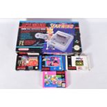 SUPER NINTENDO ENTERTAINMENT SYSTEM BOXED WITH A QUANTITY OF GAMES, games include Doom, Starwing,