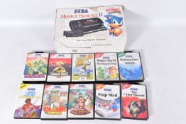 SEGA MASTER SYSTEM II BOXED WITH A QUANTITY OF GAMES, games include Sonic The Hedgehog, Wonder Boy