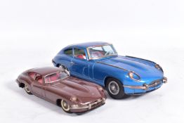 AN UNBOXED NOMURA TINPLATE FRICTION DRIVE JAGUAR E TYPE, metallic blue body, red and white interior,