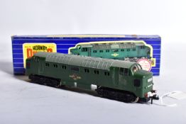 A BOXED HORNBY DUBLO DELTIC LOCOMOTIVE, unnumbered in B.R. green livery (3232), appears largely