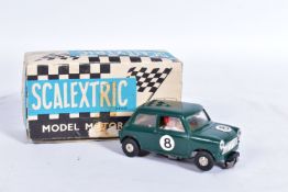 A BOXED SCALEXTRIC MINI COOPER, No.C76, green with RN8, complete with driver and in good condition