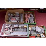 A LARGE COLLECTION OF OO GAUGE MODEL RAILWAYS BUILDINGS AND ACCESSORIES, mainly constructed