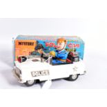 A BOXED NOMURA (TN TOYS) TINPLATE BATTERY OPERATED MYSTERY POLICE CAR, not tested, appears largely