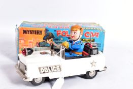 A BOXED NOMURA (TN TOYS) TINPLATE BATTERY OPERATED MYSTERY POLICE CAR, not tested, appears largely