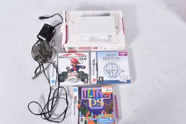 A WHITE DS LITE COMPLETE WITH ITS BOX, includes a charger, Mario Kart DS, Tetris Ds and Dr.