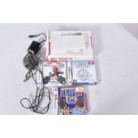 A WHITE DS LITE COMPLETE WITH ITS BOX, includes a charger, Mario Kart DS, Tetris Ds and Dr.