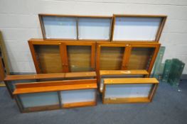 EIGHT VARIOUS COLLECTORS CABINETS, to include a pair of double door cabinets, width 115cm x depth