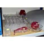 A QUANTITY OF CUT CRYSTAL AND COLOURED GLASS, comprising a set of eleven long stemmed wine