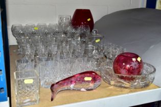 A QUANTITY OF CUT CRYSTAL AND COLOURED GLASS, comprising a set of eleven long stemmed wine