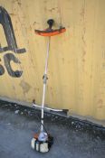 A PROGEN TOOLS 3.6HP PETROL STRIMMER (condition:-untested)