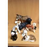 A GROUP OF SEVEN ROYAL DOULTON, BESWICK AND BORDER FINE ARTS ANIMALS, the Royal Doulton comprising