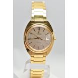 A GENTLEMANS GOLD PLATED OMEGA WRISTWATCH, the circular champagne dial, with baton hourly markers,