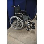 A PERFORMANCE HEALTH DAYS WHEELCHAIR, self-propelled with footrests (in good used condition) with