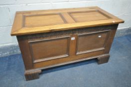 AN EARLY TO MID 20TH CENTURY OAK BLANKET CHEST, on bracket feet, width 97cm x depth 49cm x height