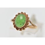 A 9CT GOLD CHRYSOPRASE SINGLE STONE RING, the oval chrysoprase cabochon collet set with rope twist