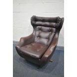 A MID CENTURY PARKER KNOLL STATESMAN BROWN LEATHERETTE SWIVEL ARMCHAIR (this armchair does not