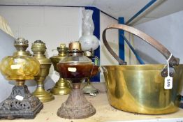 A GROUP OF OIL LAMP BASES, ELECTRIC TABLE LAMP AND BRASS JAM PAN, comprising two brass oil lamp