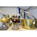 A GROUP OF OIL LAMP BASES, ELECTRIC TABLE LAMP AND BRASS JAM PAN, comprising two brass oil lamp